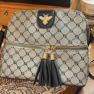 Elegant Black and Tan Designer Crossbody Bag NWOT